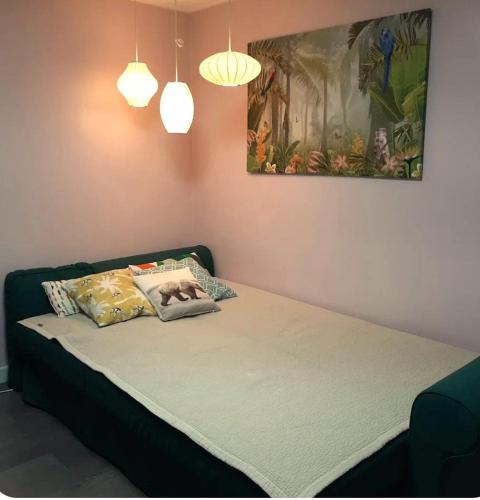 En eller flere senge i et værelse på Mapo 2bedroom house