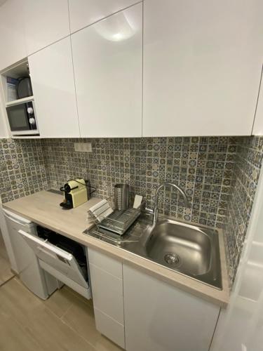 Vízipók apartmanにあるキッチンまたは簡易キッチン