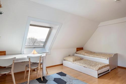 Postel nebo postele na pokoji v ubytování Haus Doktor Saeltzer