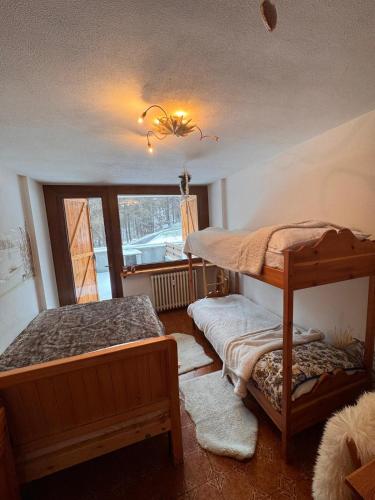 Postel nebo postele na pokoji v ubytování HOME Clotes