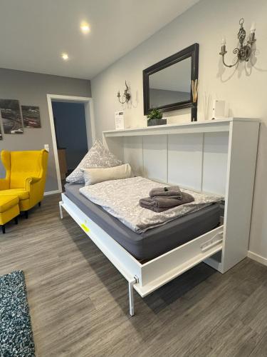 Ένα ή περισσότερα κρεβάτια σε δωμάτιο στο Kallenhard View Apartments