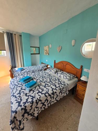 Llit o llits en una habitació de CASA DE PERSONAS