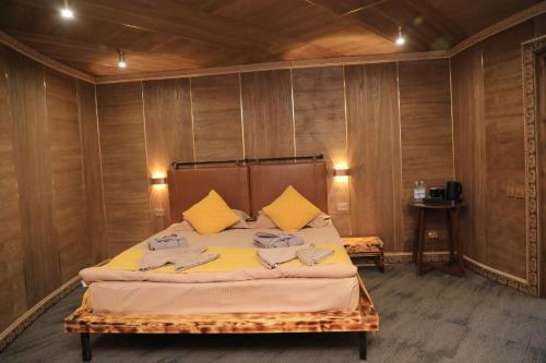 Кровать или кровати в номере My hotel Karakol
