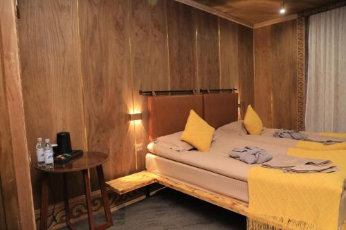 Кровать или кровати в номере My hotel Karakol