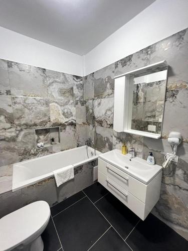 Koupelna v ubytování Luxury Cozy Apartments Suceava