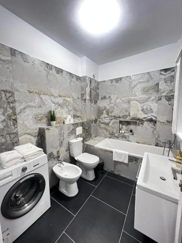 Koupelna v ubytování Luxury Cozy Apartments Suceava