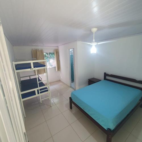 Ένα ή περισσότερα κρεβάτια σε δωμάτιο στο Pousada Sitio Ceu de Estrelas, Paraiso Cinematográfico!!