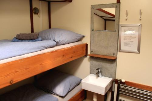 En eller flere senge i et værelse på Zeilschip Antonia