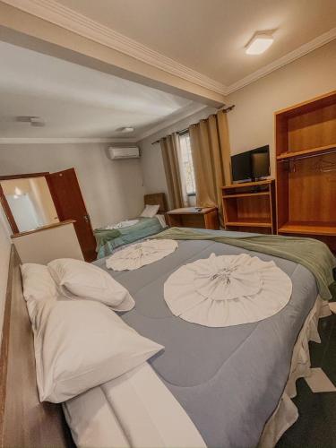 Hotel Pousada Getsemaniにあるベッド