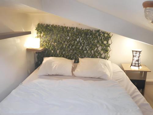 Posteľ alebo postele v izbe v ubytovaní Charmant appartement avec loggia à Saint-Hilaire-de-Riez - 18 m²