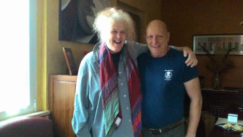 a man and a woman holding a tie at B&B A Casa di Mael in San Costanzo