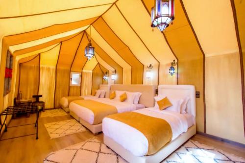 Postel nebo postele na pokoji v ubytování Top Luxury Camp