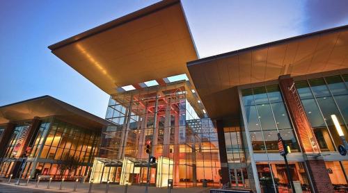 a large glass building with a lot of windows at Downtown Indy Lucas Oil Conv Center Skywalk#5 in Indianapolis