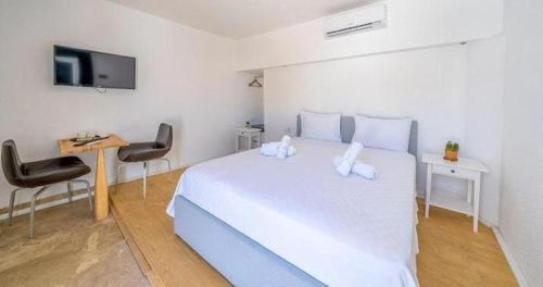 Ένα ή περισσότερα κρεβάτια σε δωμάτιο στο Boti Butik Otel
