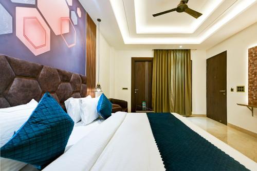 En eller flere senge i et værelse på The Grand Plaza