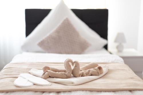 Ένα ή περισσότερα κρεβάτια σε δωμάτιο στο Lemsdorfer Apartments Magdeburg