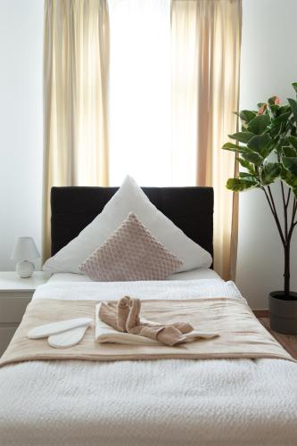 Ένα ή περισσότερα κρεβάτια σε δωμάτιο στο Lemsdorfer Apartments Magdeburg