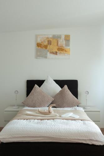 Ένα ή περισσότερα κρεβάτια σε δωμάτιο στο Lemsdorfer Apartments Magdeburg