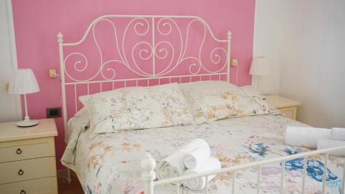 Letto o letti in una camera di A casa di Mario e Nenè