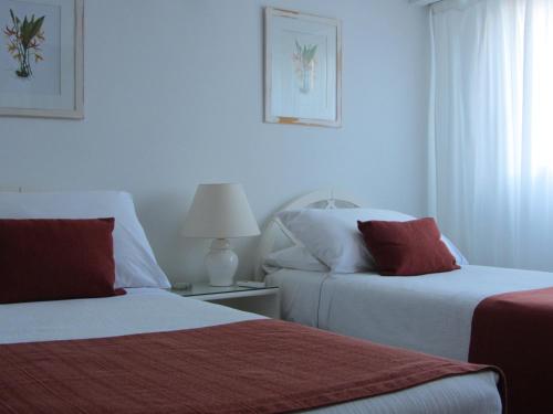 Postel nebo postele na pokoji v ubytování BDA Hotel & Spa
