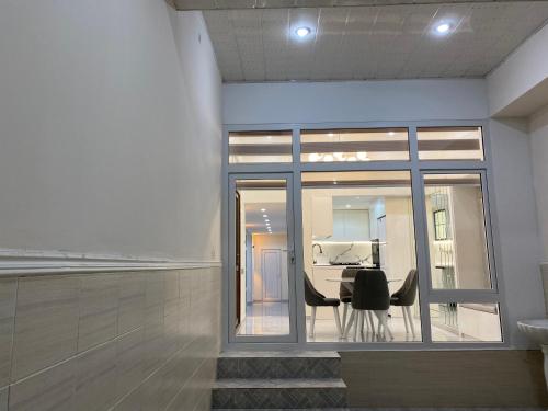 a dining room with a table and chairs at House in Quba in Quba