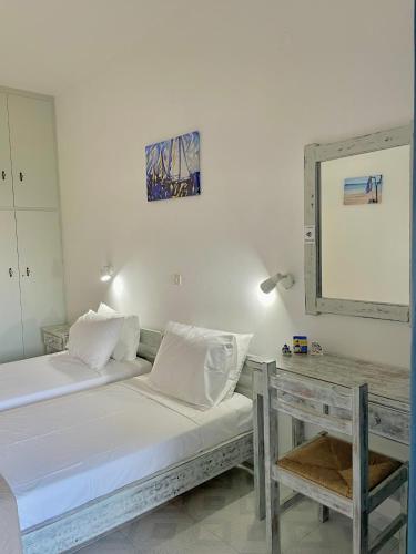 Katil atau katil-katil dalam bilik di Star Studios Paros
