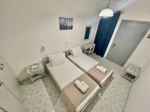 Katil atau katil-katil dalam bilik di Star Studios Paros