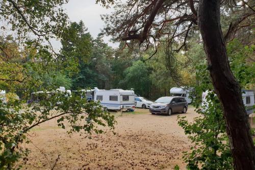 a group of vehicles parked in a parking lot at First Camp Lilleby in Torslanda