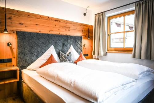 Postel nebo postele na pokoji v ubytování Landhaus Bernhard