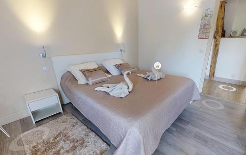 Katil atau katil-katil dalam bilik di Chambre double balnéo