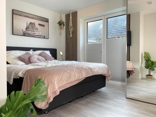 Ένα ή περισσότερα κρεβάτια σε δωμάτιο στο Sielhuus 3