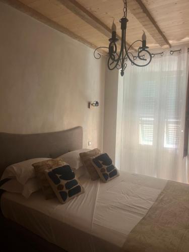 En eller flere senge i et værelse på Appartement prestige, cour Paoli