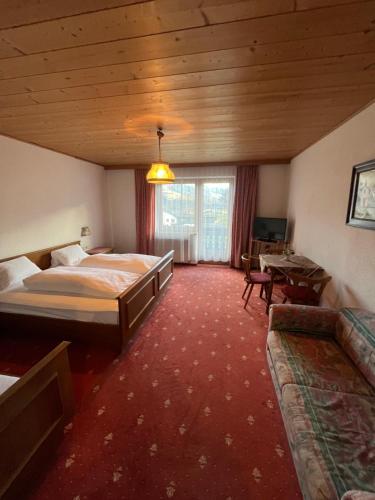 Postel nebo postele na pokoji v ubytování Pension Kohler