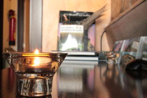 a candle sitting on top of a table at Hotel Gran Casona de Sanabria in Puebla de Sanabria