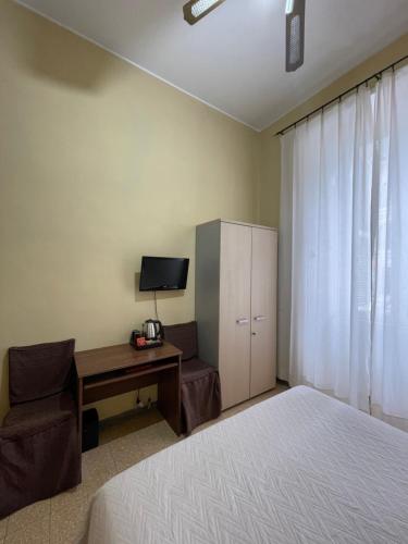 Televízia a/alebo spoločenská miestnosť v ubytovaní Guest House Meret