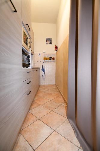 Η κουζίνα ή μικρή κουζίνα στο B&B VILLAGRANDE ROOMS