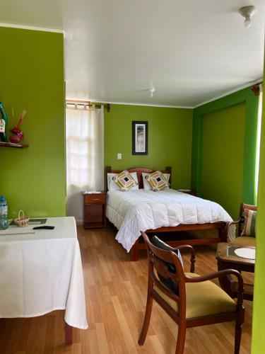 Postel nebo postele na pokoji v ubytování RESORT ALAPA
