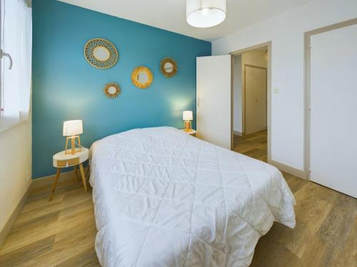 Postel nebo postele na pokoji v ubytování À 110 m de la plage, appartement moderne pour 4