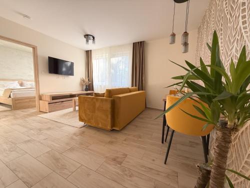 TV a/nebo společenská místnost v ubytování Viola Apartman