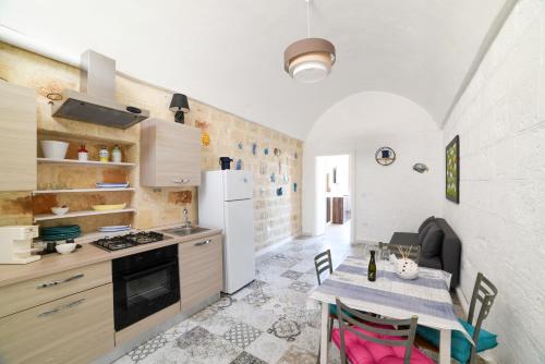 A kitchen or kitchenette at Al Console Le Dimore Apartment