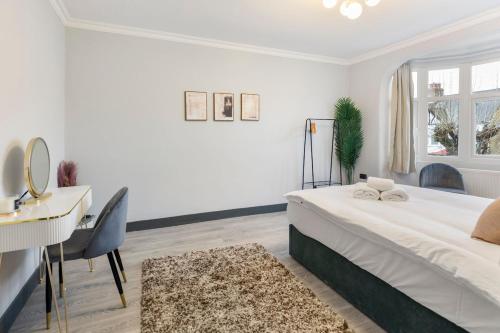 Ένα ή περισσότερα κρεβάτια σε δωμάτιο στο Modern spacious House next 02 Arena And LCY