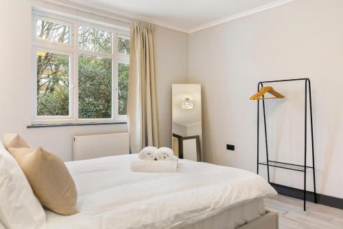 Ένα ή περισσότερα κρεβάτια σε δωμάτιο στο Modern spacious House next 02 Arena And LCY