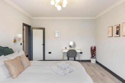 Ένα ή περισσότερα κρεβάτια σε δωμάτιο στο Modern spacious House next 02 Arena And LCY