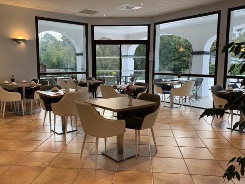 Coin salon dans l'établissement Hôtel La Bastide Saint Martin
