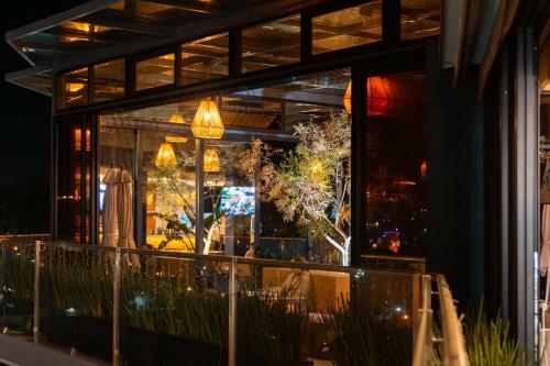 a window of a store with lights in it at Hotel GRALTA in Jalostotitlán