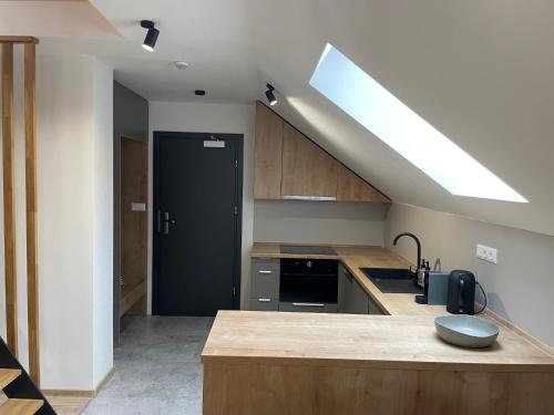 Una cocina o zona de cocina en Apartmány Kellov Dom