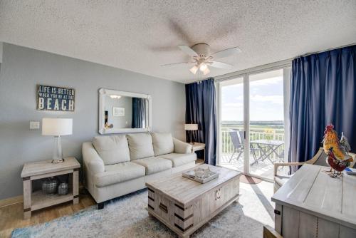 a living room with a couch and a table at The Salt Cay - Sunrise Suites in Key West