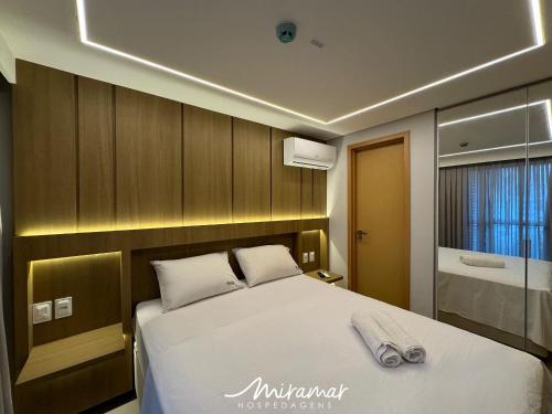 Кровать или кровати в номере Oceânica - Cabo Branco