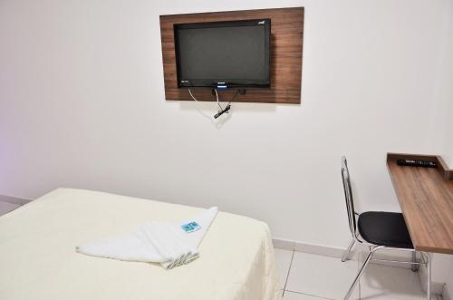 Hotel Norteにあるテレビまたはエンターテインメントセンター