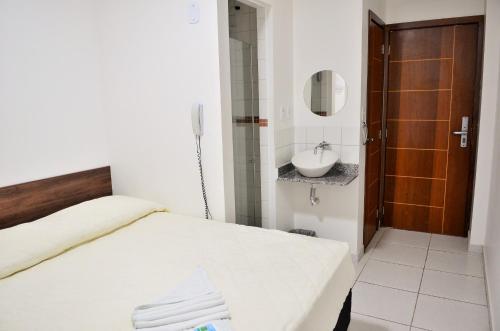 Säng eller sängar i ett rum på Hotel Norte